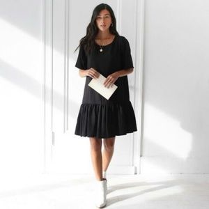 EMMA KNUDSEN LAUREN BLACK RUFFLE PEPLUM DRESS L